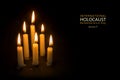 Holocaust Remembrance Day, January 27, candles against black background