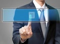 businessman hand pushing button on a touch screen interface with blue background Royalty Free Stock Photo