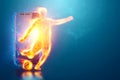 A hologram of a football player running out of a smartphone screen. The concept of sports betting, football, gambling, online Royalty Free Stock Photo