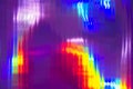 Holographic abstract background. Rainbow neon glass texture pattern. Trendy colorful reeded refract effect