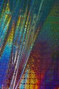 Holographic Abstract Foil Backdrop. Trendy creative hologram gradient rainbow. Top view, flat lay