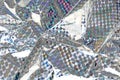 Holographic aluminium foil decor foil closeup pattern texture as background. Macro photo Royalty Free Stock Photo