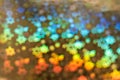 Holographic background with abstract colorful blur stars shaped bokeh Royalty Free Stock Photo