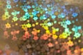 Holographic background with abstract colorful blur stars shaped bokeh Royalty Free Stock Photo