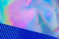 Holographic background with blue metallized corrugated paper