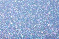 Holographic bright light blue glitter real texture background