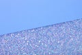 Holographic bright white glitter real texture background.