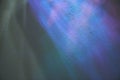 Holographic colors of lights and mother-of-pearl foil. Holographic abstract background in blue tones. Rainbow foil light Royalty Free Stock Photo