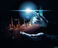 Holographic graph with growing indicators and a woman's hand. Business growth concept, profitable startup