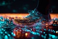 Holographic projection of a sports sneaker with neon lighting on navy blue background. Flickering flux of particle