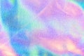 Holographic real texture in blue pink green colors with scratches and irregularities Royalty Free Stock Photo