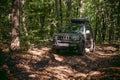 Holovchyntsi, Khmelnytskyi, Ukraine - September 18, 2023: Suzuki Jimny off-road vehicle, dark gray, roof rack, autumn day. A car