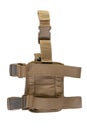 Holster hanging on a soldier`s leg. Leg holder for gun. Isolated military tactical