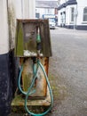 HOLSWORTHY, DEVON, UK - JULY 16 2020: An old diesel pump distributor rusting. Royalty Free Stock Photo