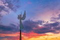 Holy Angel Sculpture against dramatic sky and clouds Royalty Free Stock Photo