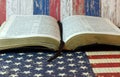 Holy Bible against an American Flag Royalty Free Stock Photo