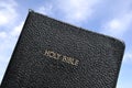 Holy Bible Against a Blue Sky Royalty Free Stock Photo