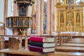 Holy bible on bench inside church.