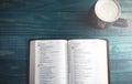 Holy Bible on a Blue Wooden Table Royalty Free Stock Photo