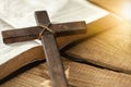 Holy Bible book and cross on wooden background Royalty Free Stock Photo