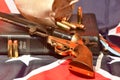 Holy Bible, bull scrotum, bullets, and revolver on the rebel flag Royalty Free Stock Photo