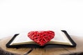 Holy Bible. Easter - Christ. Open bible on the table. Prayer. Resurrected resurrection. Red heart, God`s love concept. Royalty Free Stock Photo