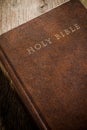 The Holy Bible on old wooden table Royalty Free Stock Photo
