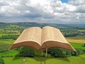 Holy bible open book heaven scripture prayer pray psalms worship god land earth world globe planet green Royalty Free Stock Photo