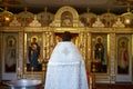 Holy Bible, Orthodox cross and Bowl prepared for christening ceremony Royalty Free Stock Photo