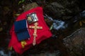 Holy Bible and the Orthodox Cross during the sacrament of baptism . Royalty Free Stock Photo