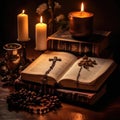 Holy Bible, rosary beads and candles on wooden background Royalty Free Stock Photo