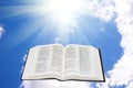 Holy bible in the sky illuminated by a sunlight Royalty Free Stock Photo