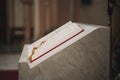 Holy bible on table during a wedding ceremony nuptial mass. Religion concept. Catholic eucharist ornaments for the celebration of Royalty Free Stock Photo