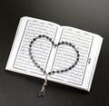 Holy Book of Quran With Heart Shaped Rosary Royalty Free Stock Photo