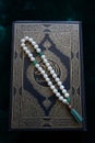 Holy book of Quran with rosary, Ramadan concept