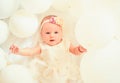 Holy child. Family. Child care. Childrens day. Small girl. Happy birthday. Portrait of happy little child in white Royalty Free Stock Photo