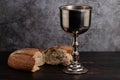 Holy communion chalice with wine and bread