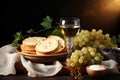 Holy Communion. A chalice of wine, bread, grapes and ears of wheat