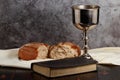 Holy communion chalice with wine and bread Royalty Free Stock Photo