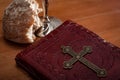 Holy Communion and Easter concept with The Holy Bible. bread and a silver chalice of red wine Royalty Free Stock Photo