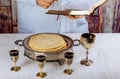 Holy communion on wooden table on church. Communion.Cup of glass with red wine, bread and Holy Bible Royalty Free Stock Photo