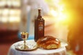 Holy communion on wooden table in church.Taking Communion.Cup of glass with red wine, bread on table.The Feast of Corpus Christi Royalty Free Stock Photo