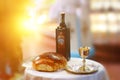 Holy communion on wooden table in church.Taking Communion.Cup of glass with red wine, bread on table.The Feast of Corpus Christi Royalty Free Stock Photo