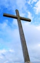 Holy Cross against Background of Blue Sky and White Clouds Royalty Free Stock Photo