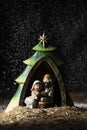 The holy family in a rustic nativity scene Royalty Free Stock Photo