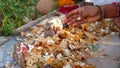 Selective focus on Ornamented plate with different delicious food for Hindu God worship in a temple. Sacred food holding in plate