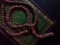 Holy islamic book quran closed and rosary beads Royalty Free Stock Photo