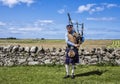 Holy Island Piper, Scotland Royalty Free Stock Photo