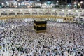 Holy Kaaba. Crowd of muslims walking around Kaaba for Tawaf during Hajj