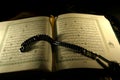 Holy Koran book and rosary Royalty Free Stock Photo